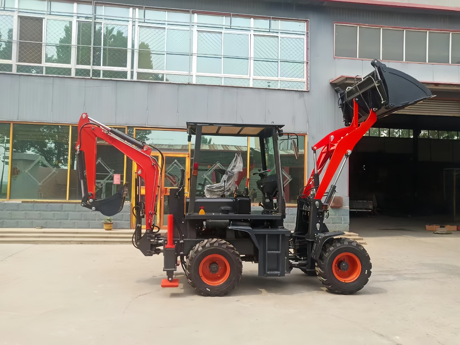 Backhoe Loader (busy at both ends)