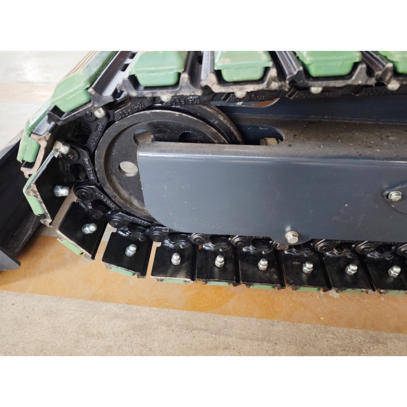 with reinforced rubber blocks added to the outermost side of the track