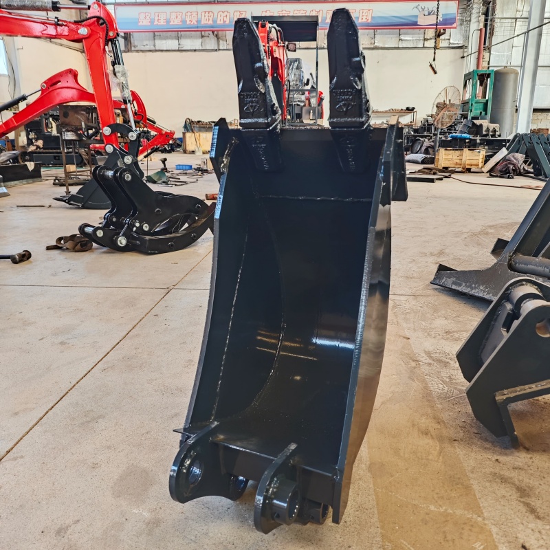 Small excavator equipped with loading attachments - small bucket/narrow bucket