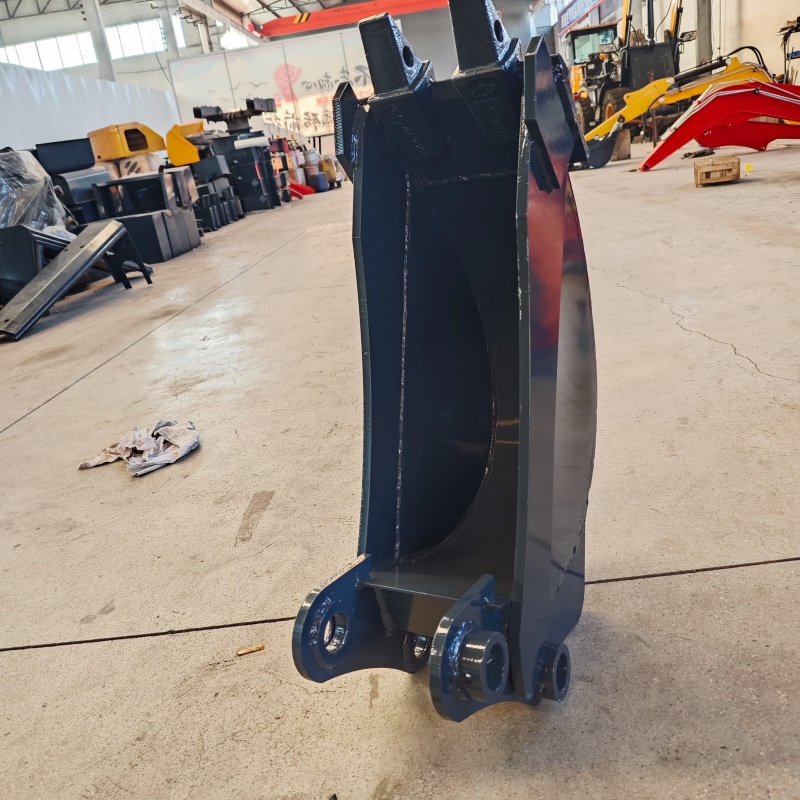 Small excavator equipped with loading attachments - small bucket/narrow bucket