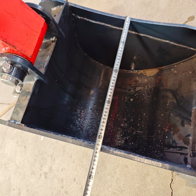 Small excavator equipped with loading attachments - log grab, small bucket, narrow bucket