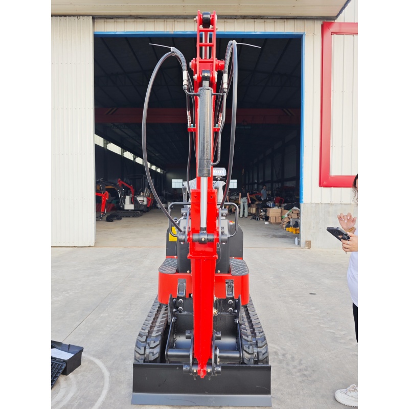 Small excavator with extendable arm - detachable