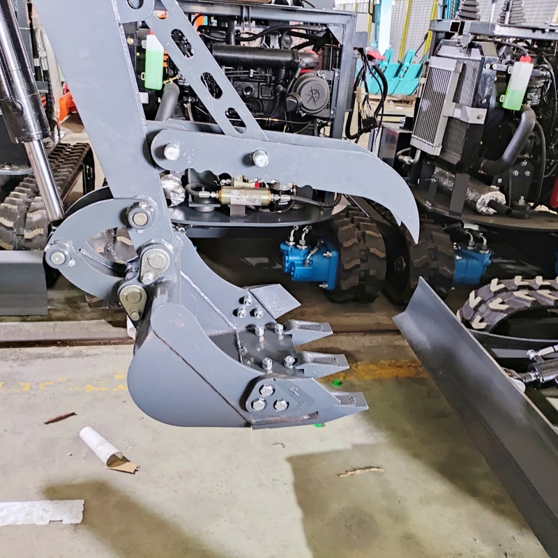 Mini excavator attachment – mechanical thumb bucket