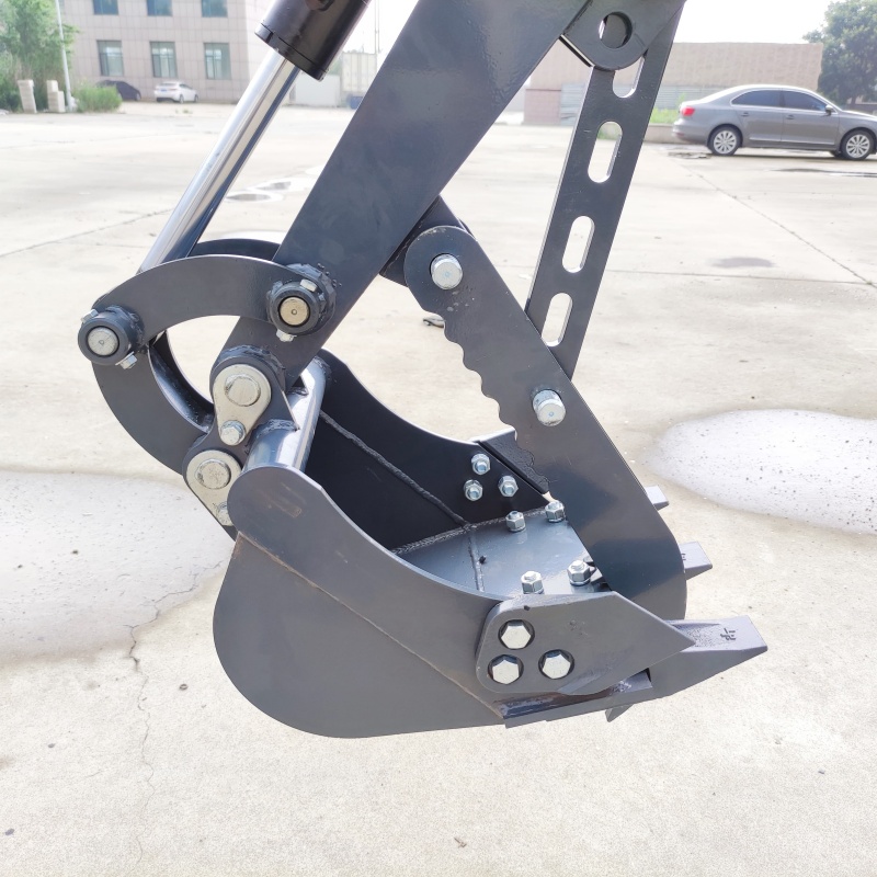 Mini excavator attachment – mechanical thumb bucket