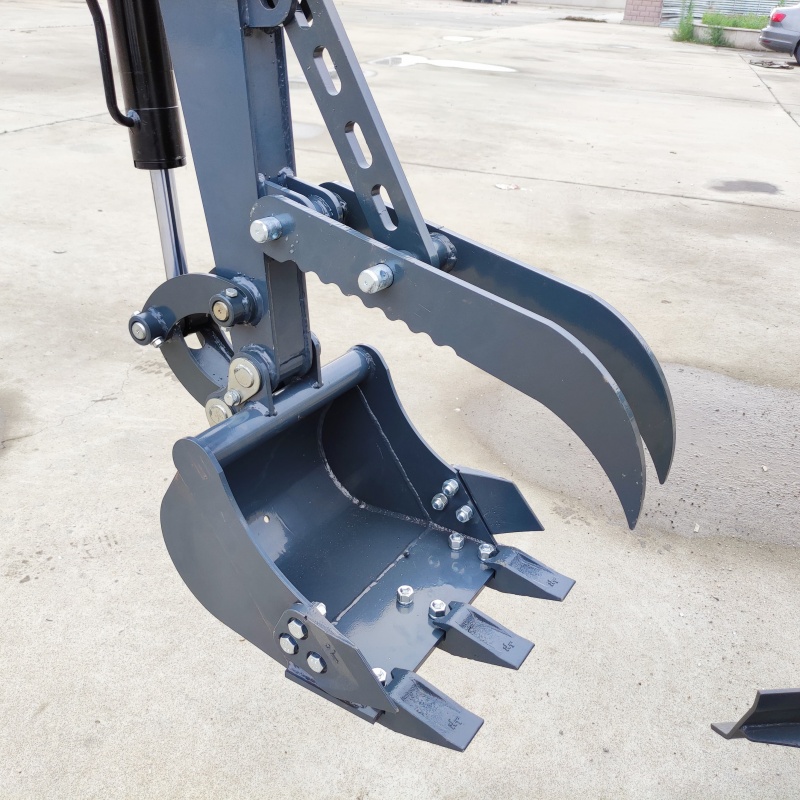 Mini excavator attachment – mechanical thumb bucket