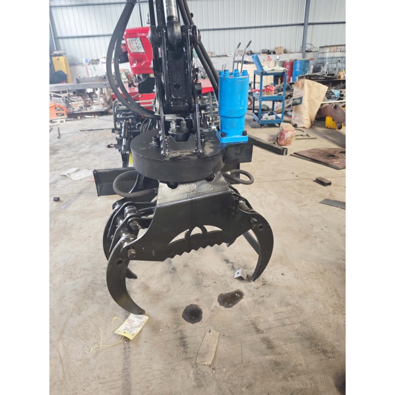 Mini excavator attachment-rotating grass and tree grabber
