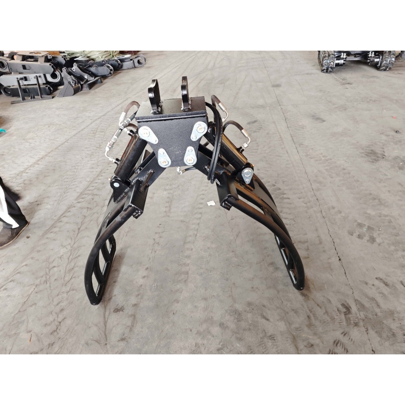 Mini excavator attachment-rotating grass and tree grabber