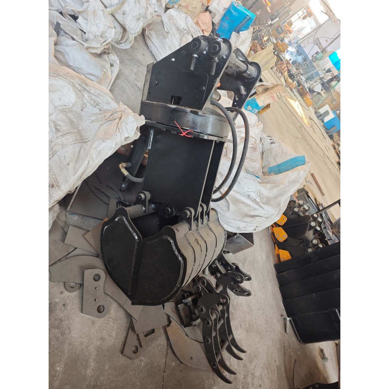 Mini excavator attachment-rotating grass and tree grabber