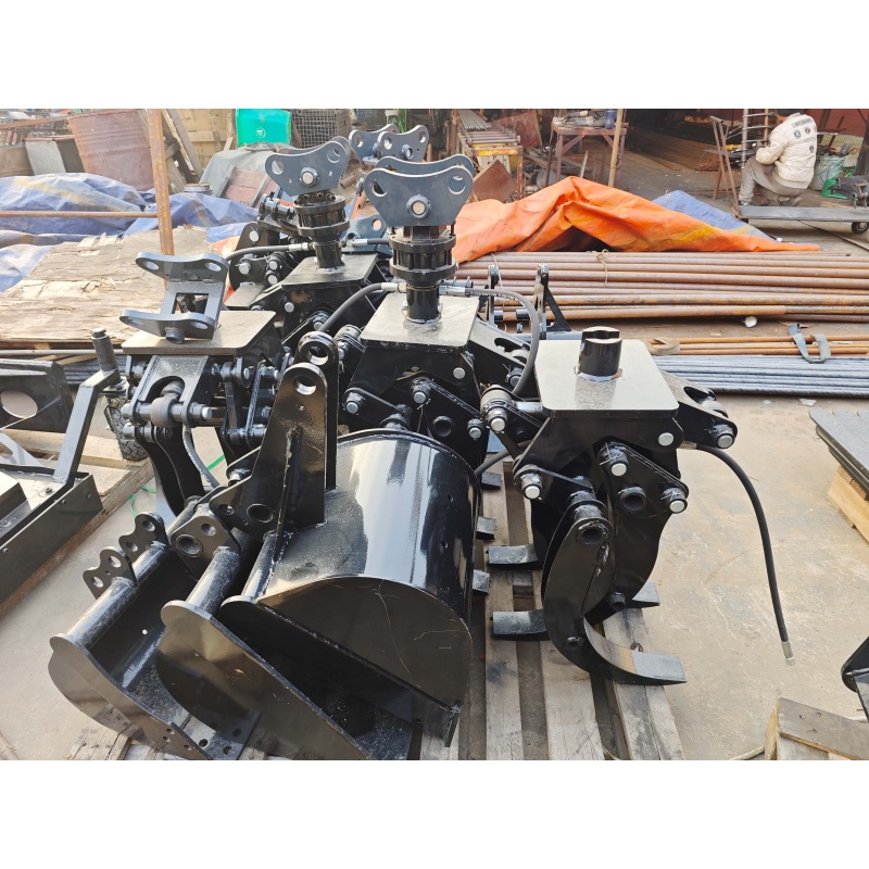 Mini excavator attachment-rotating grass and tree grabber