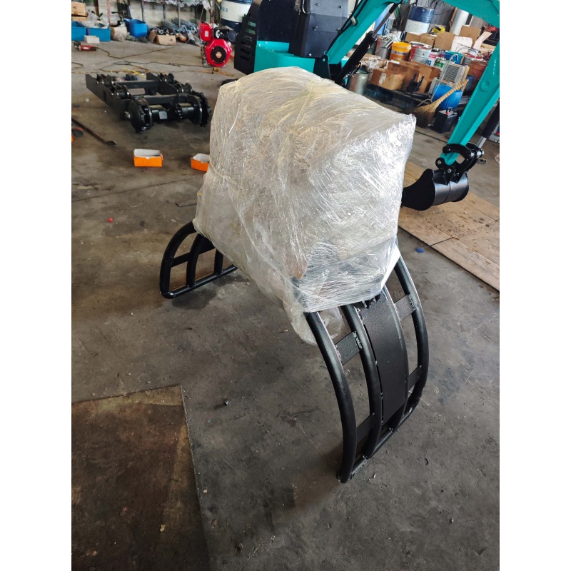 Small Excavator Attachment-Rotating Grass and Tree Catcher