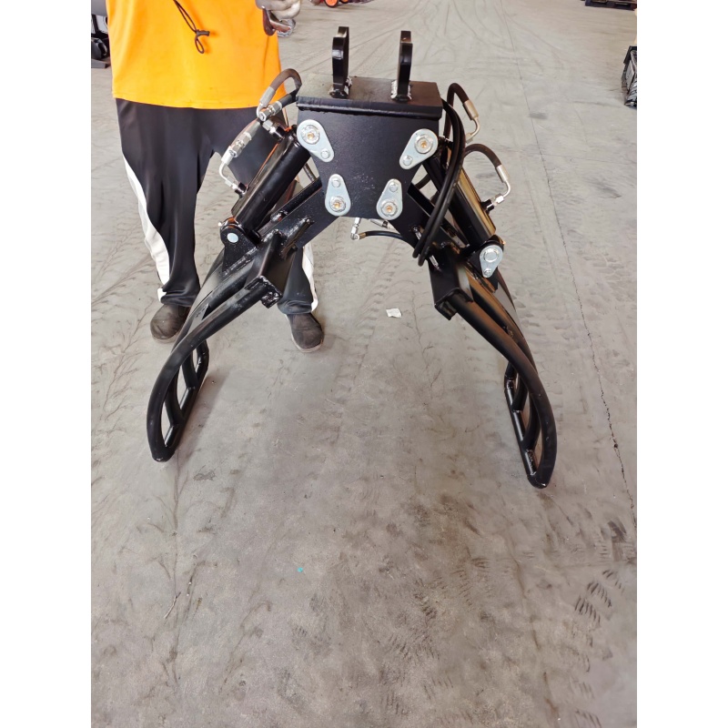 Small Excavator Attachment-Rotating Grass and Tree Catcher