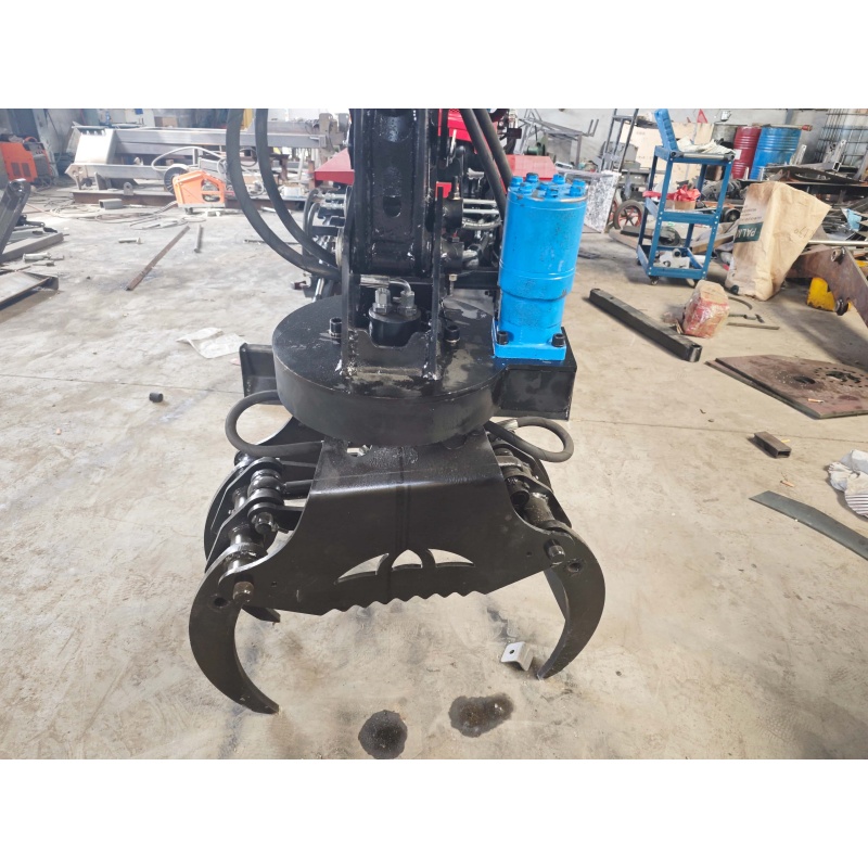 Small Excavator Attachment-Rotating Grass and Tree Catcher