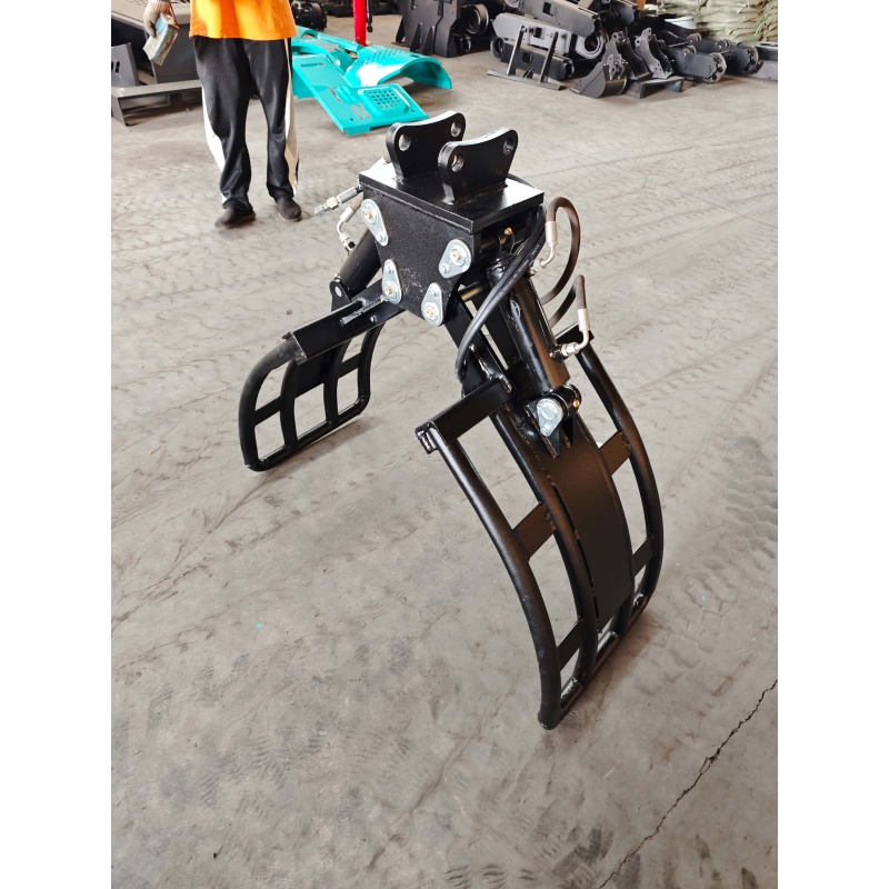 Small Excavator Attachment-Rotating Grass and Tree Catcher