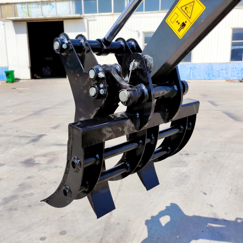 Mini excavator attachment: Grass and tree grabber