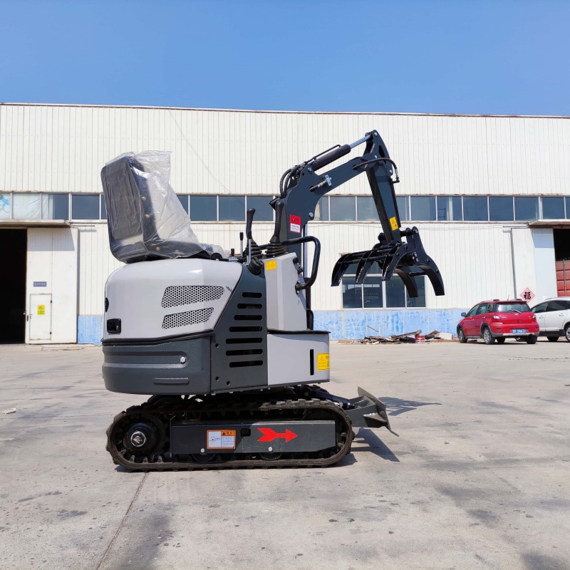 Mini excavator attachment: Grass and tree grabber