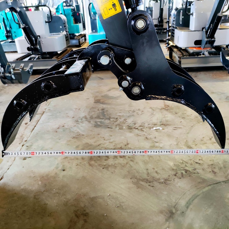 Mini excavator attachment: Grass and tree grabber