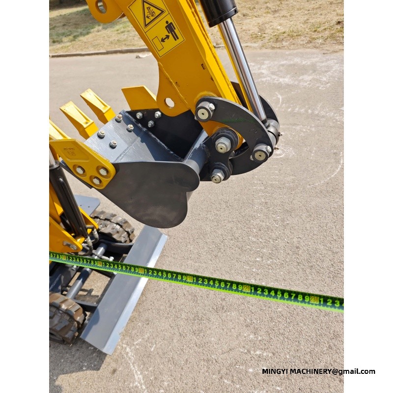 A small excavator used for interior renovations, which can be placed inside the elevator door of the building.