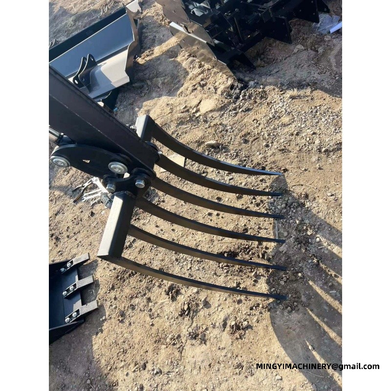 120hp farm tractor equipped with a large rake