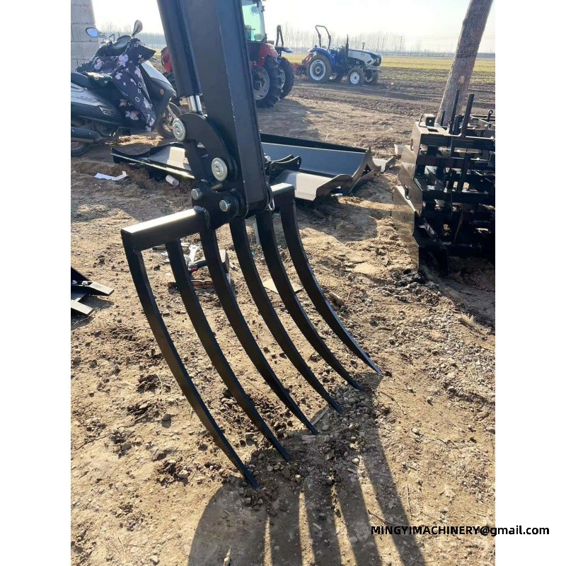 120hp farm tractor equipped with a large rake