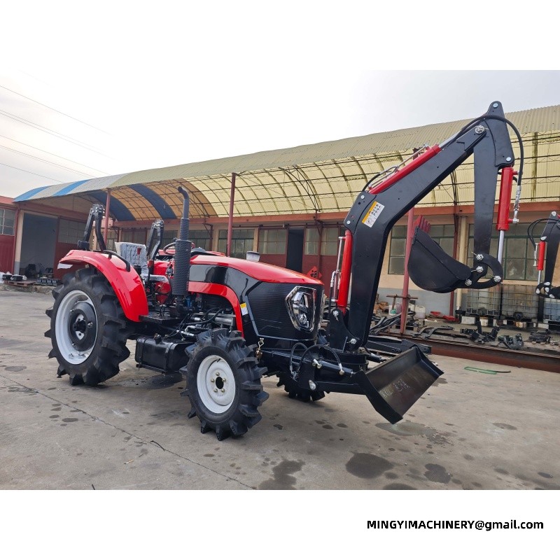 small farm tractor with backhoe attachment