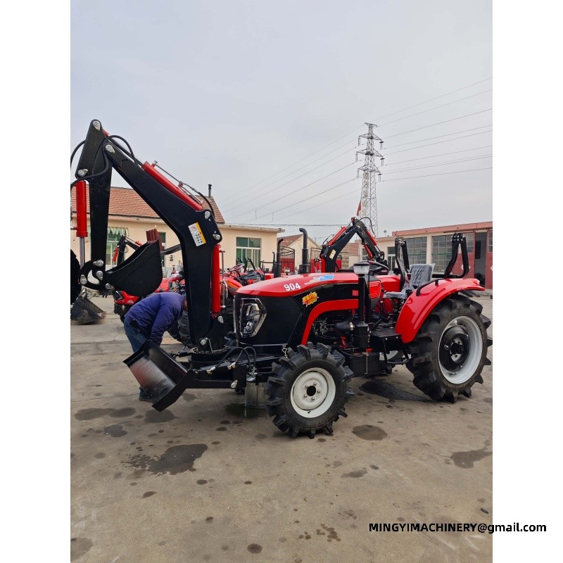small farm tractor with backhoe attachment