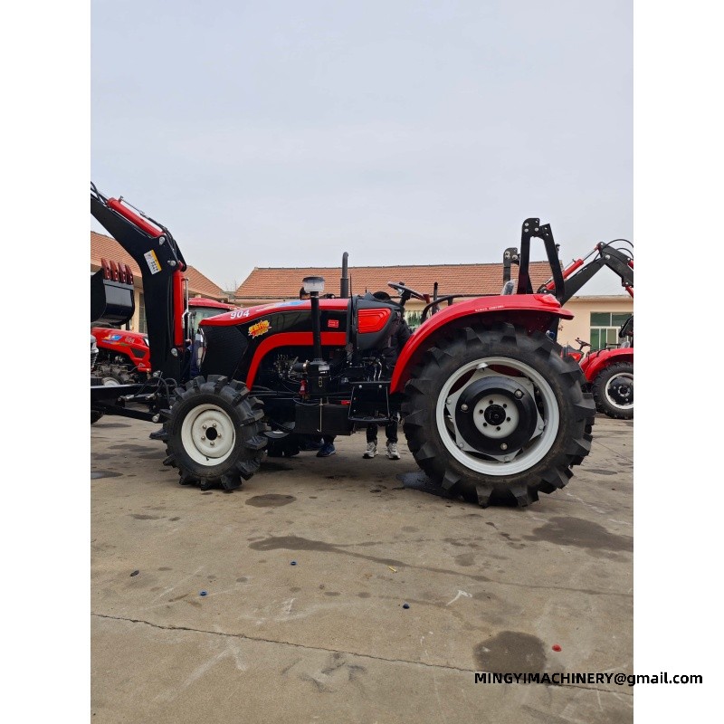 small farm tractor with backhoe attachment