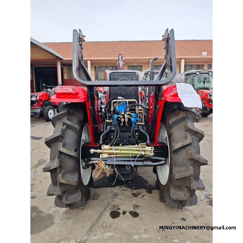 small farm tractor with backhoe attachment