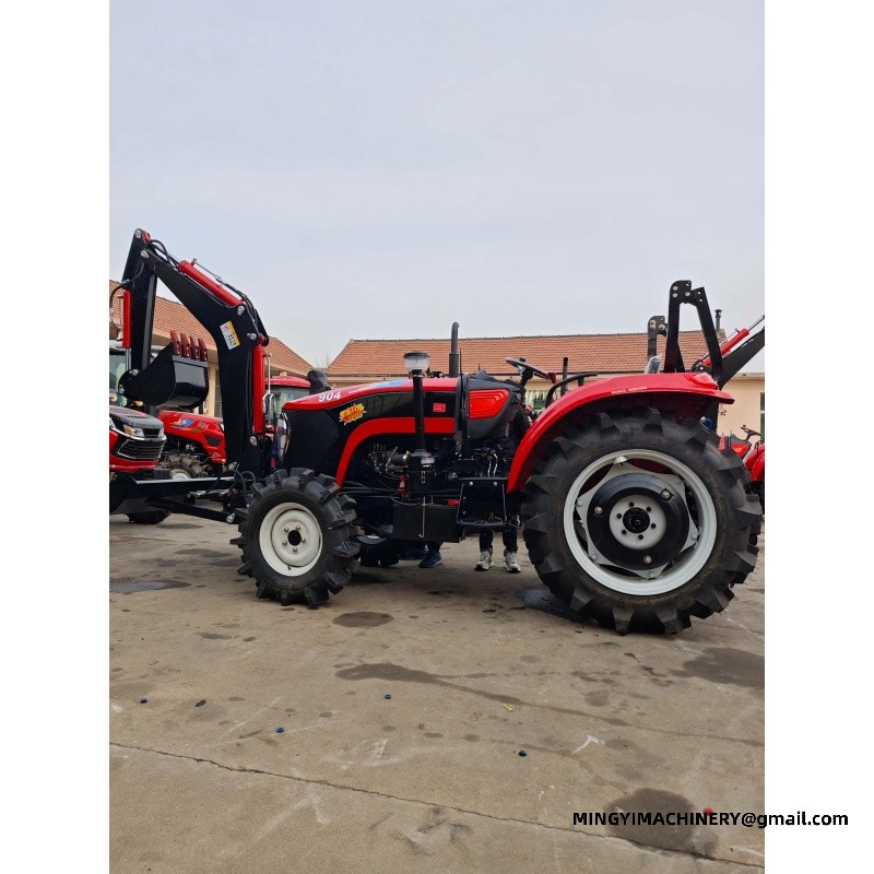 small farm tractor with backhoe attachment
