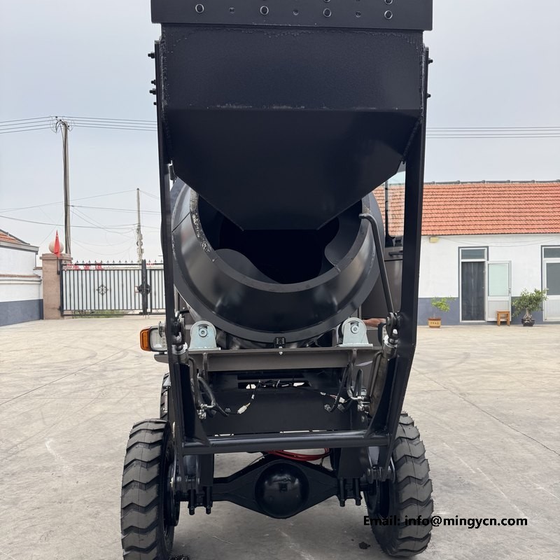 front view showing the discharge chute and loading shovel arms of the 0.8m3 mixer