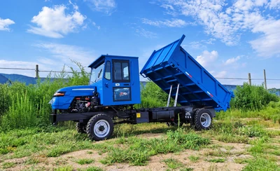 Mingyi tractor with tipping body transporting loads